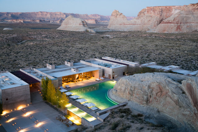 an aerial view of a house in the desert.